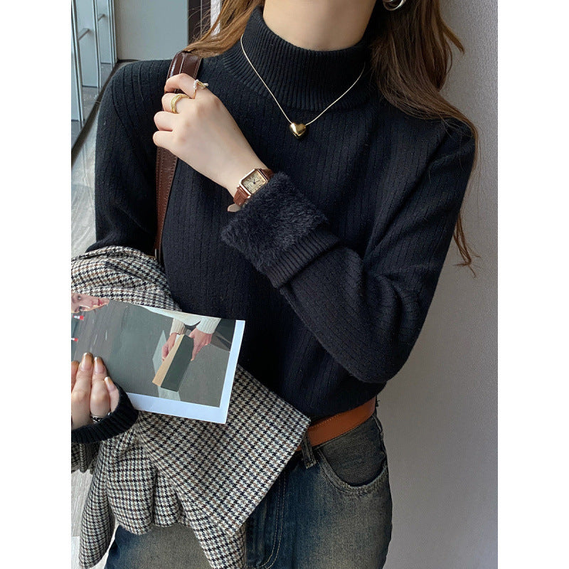 Pull femme avec col roulé et ourlet moelleux luxueux Chic & Stil