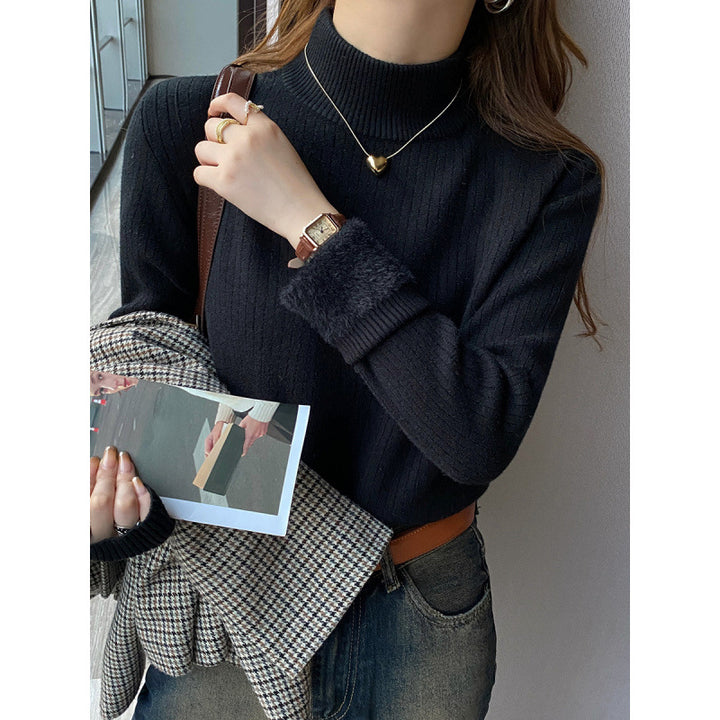 Pull femme avec col roulé et ourlet moelleux luxueux Chic & Stil
