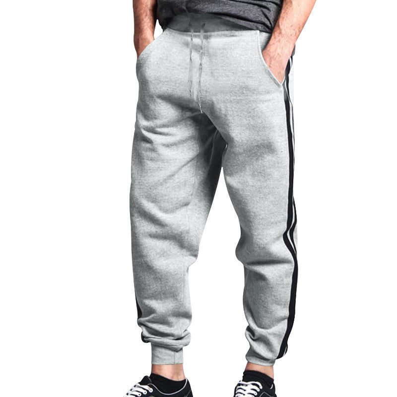 Sporty men's jogger pants with contrasting side stripes and an elastic waistband Lune London