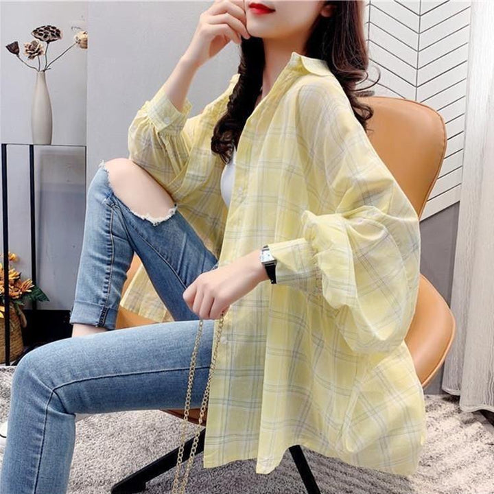Chemise blouse décontractée à carreaux pour femmes avec coupe ample Chic & Stil