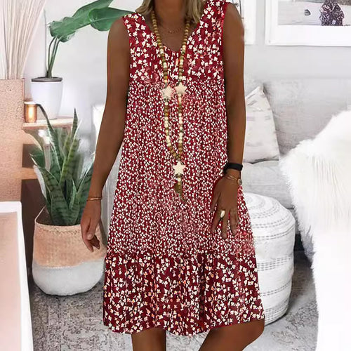 Airy summer dress for women with a playful floral pattern and a fluid silhouette Lune London