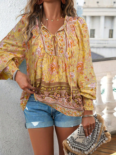 Blouse for women with floral patterns and tie neckline Lune London