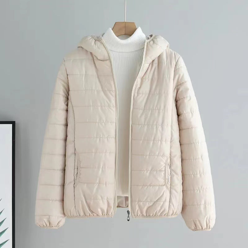 Ladies quilted transitional jacket with practical pockets and hood Lune London