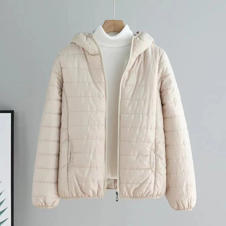 Ladies quilted transitional jacket with practical pockets and hood Lune London