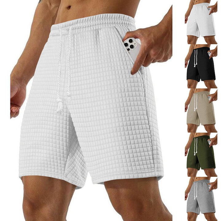 Men's sports shorts in breathable material with practical side pockets Lune London