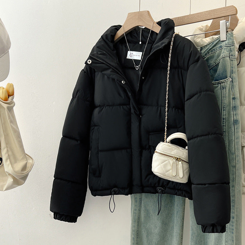 Fashionable short reversible jacket for women with high collar and practical pockets Lune London