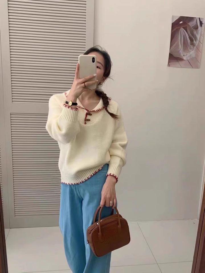 Casual knitted sweater for women with a unique button design and contrasting details Lune London
