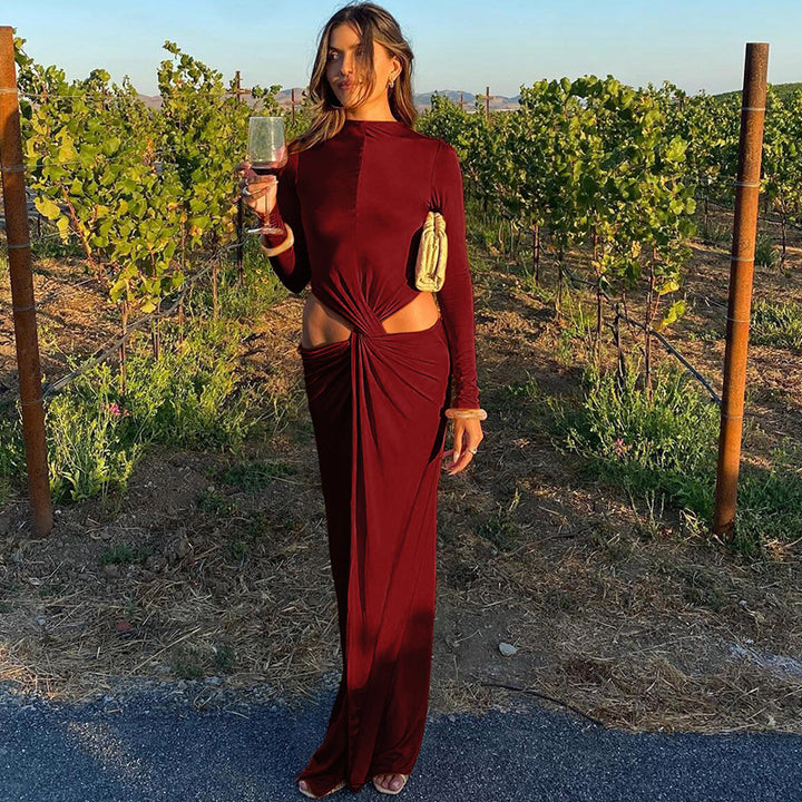 Ladies Elegant maxi dress with long sleeves featuring a refined knotted design and chic side cutouts.