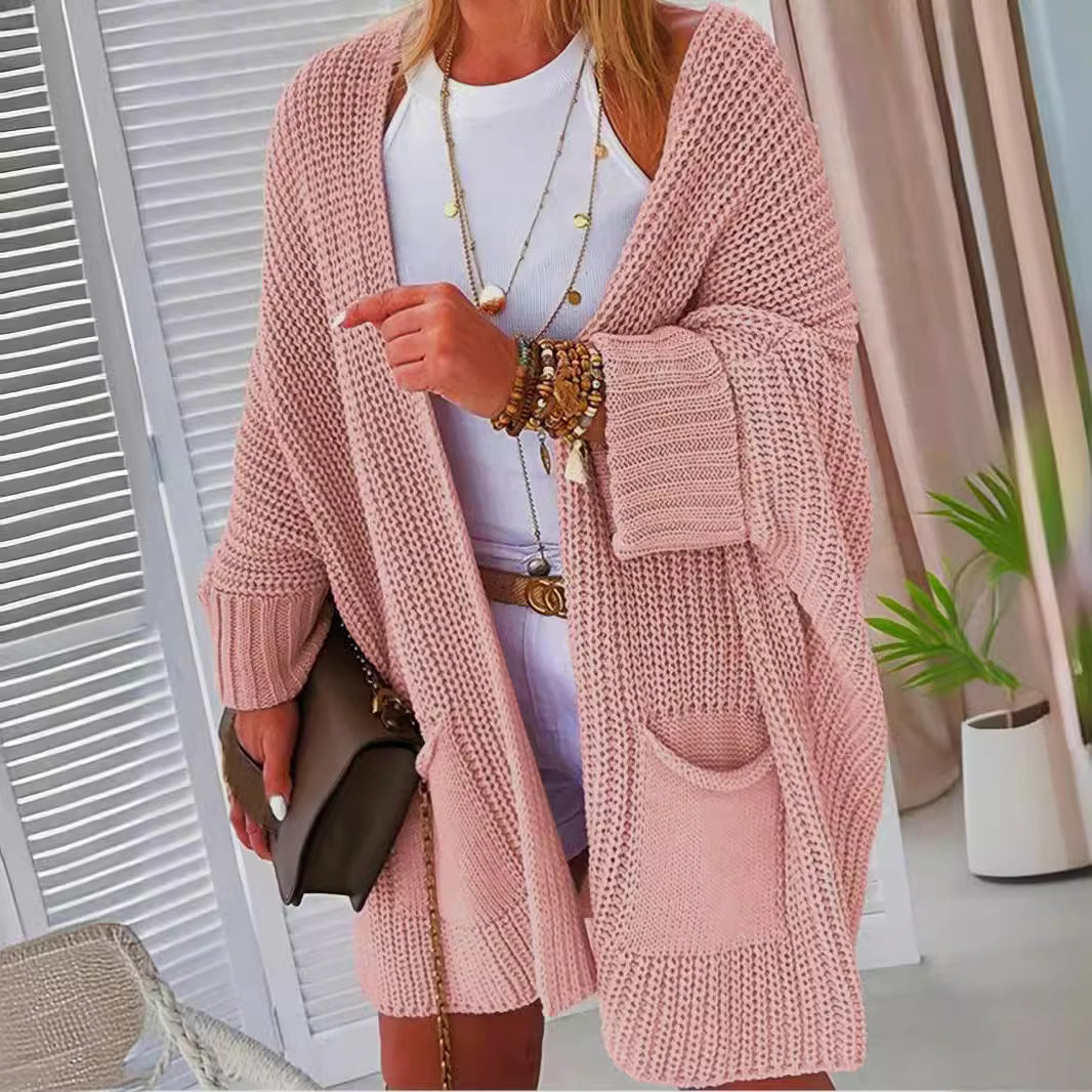 Thick knit vests for women with open sleeves and practical pockets