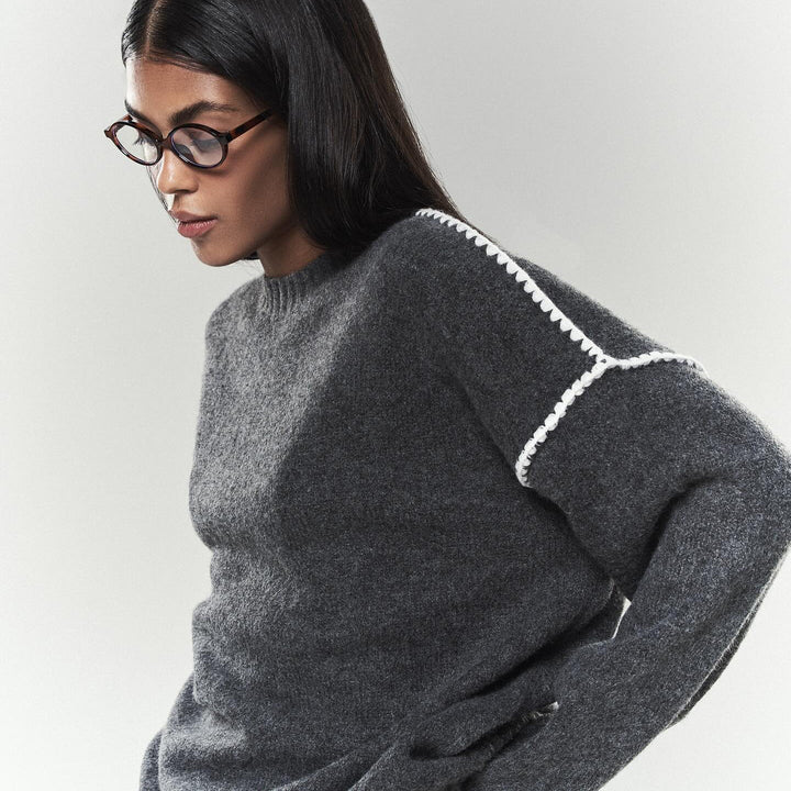 Elegant knitted sweater for women with unique ribbed structures and trendy accents Lune London