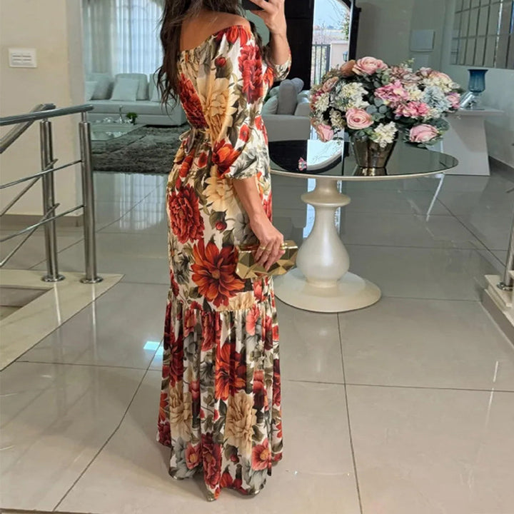 Robe maxi florale pour femmes avec design décolleté et ourlet à volants Chic & Stil
