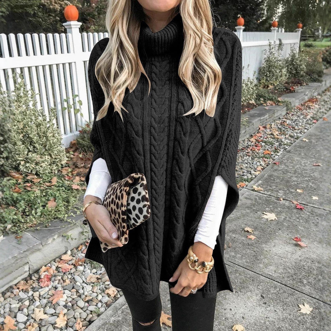Knit poncho for women with high collar and decorative cable knit pattern Lune London