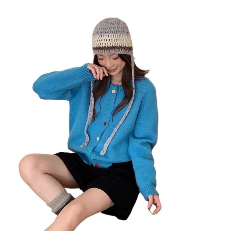 Gilet en tricot ludique pour femme avec détails de boutons colorés et coupe décontractée Chic & Stil