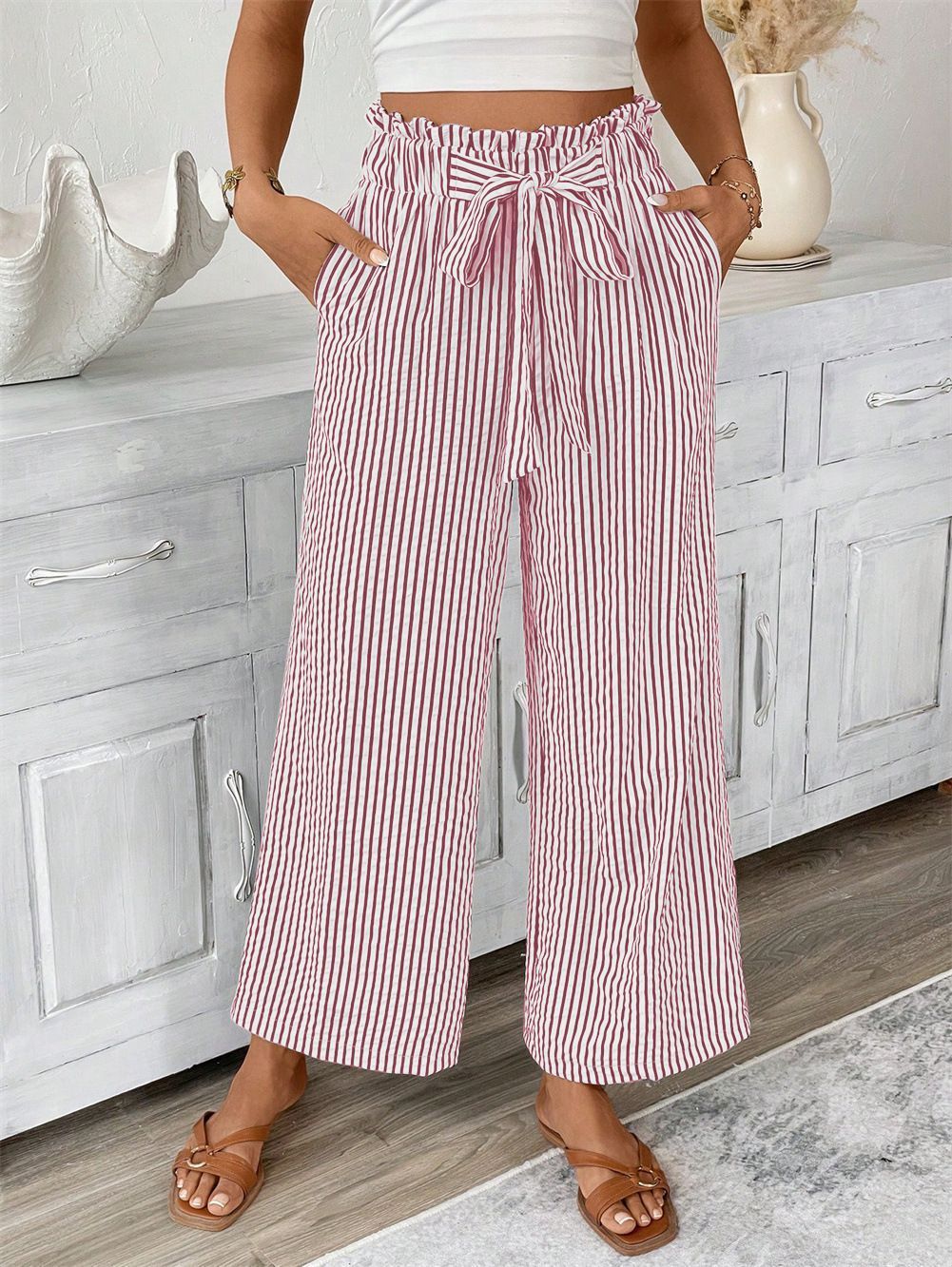 Wide striped leisure trousers for women with a tie belt Lune London