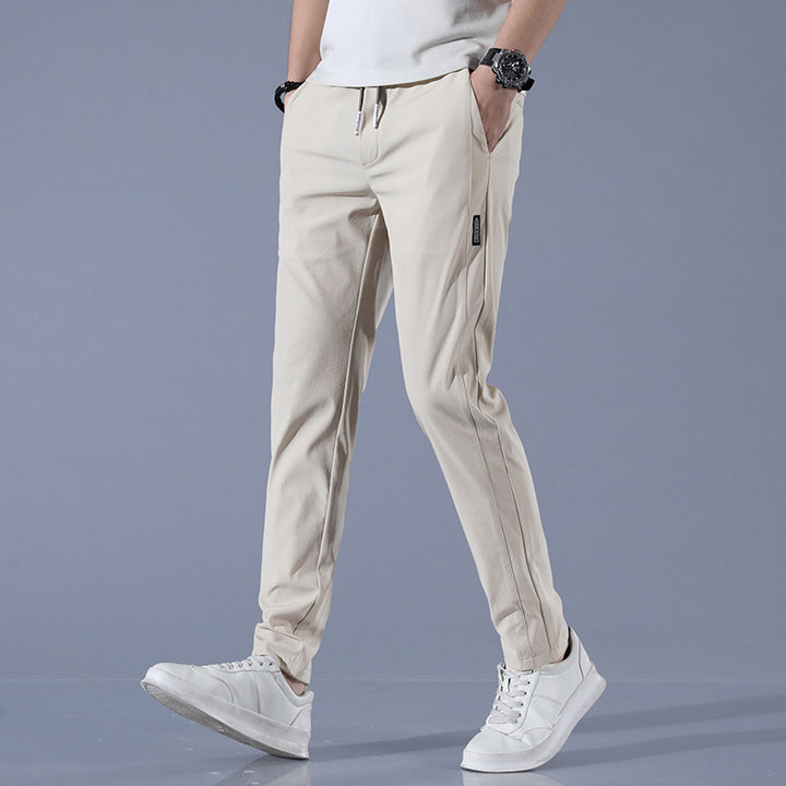 Sports jogger pants for men with elastic waist and practical zip pockets Lune London
