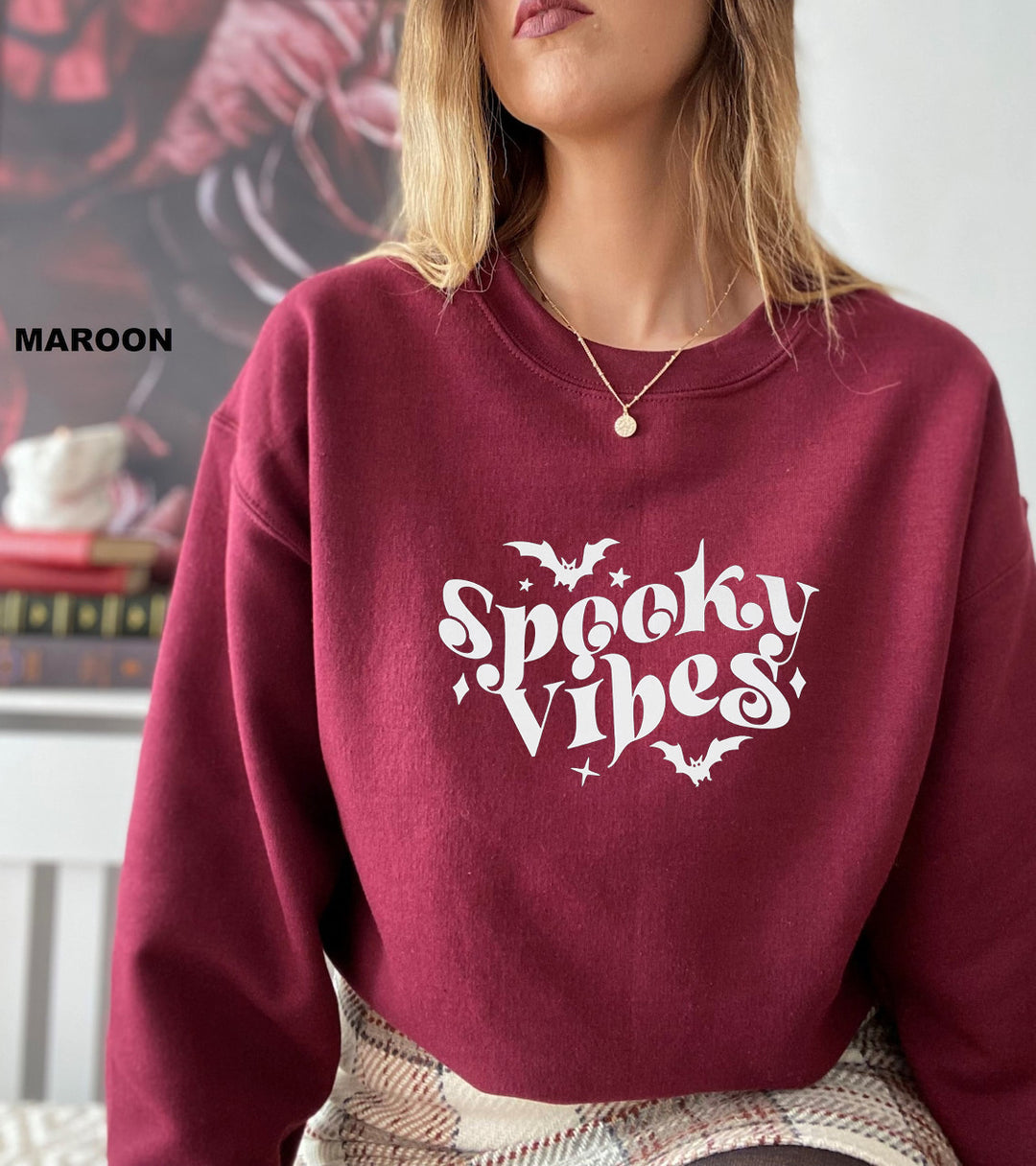 Sweat à capuche pour femmes avec un design Halloween ludique et une coupe confortable Chic & Stil