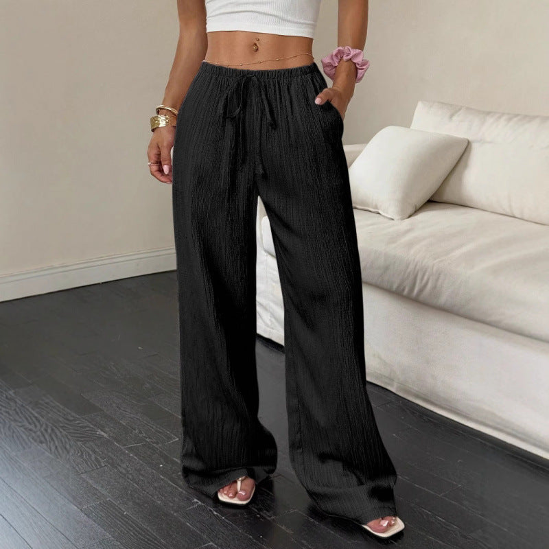 Casual and wide trousers for women with elastic waist and tie belt Lune London