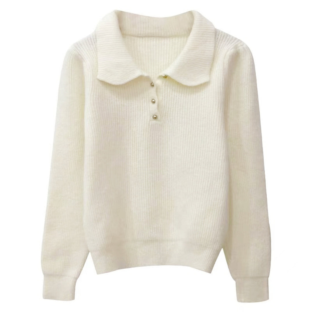 Pull féminin avec col polo texturé et détails de boutons Chic & Stil
