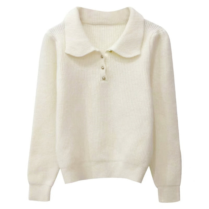 Pull féminin avec col polo texturé et détails de boutons Chic & Stil