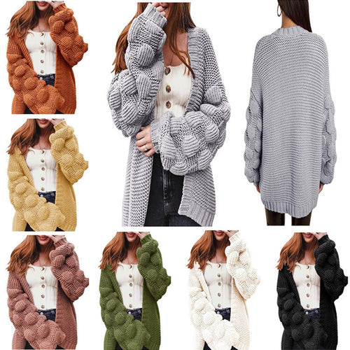 Knitted women's jacket with voluminous puff sleeves and a structured knit look Lune London