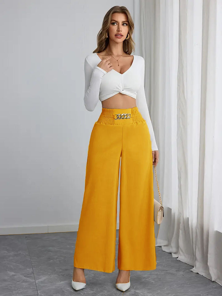 Wide palazzo trousers for women with elastic waistband and decorative belt Lune London