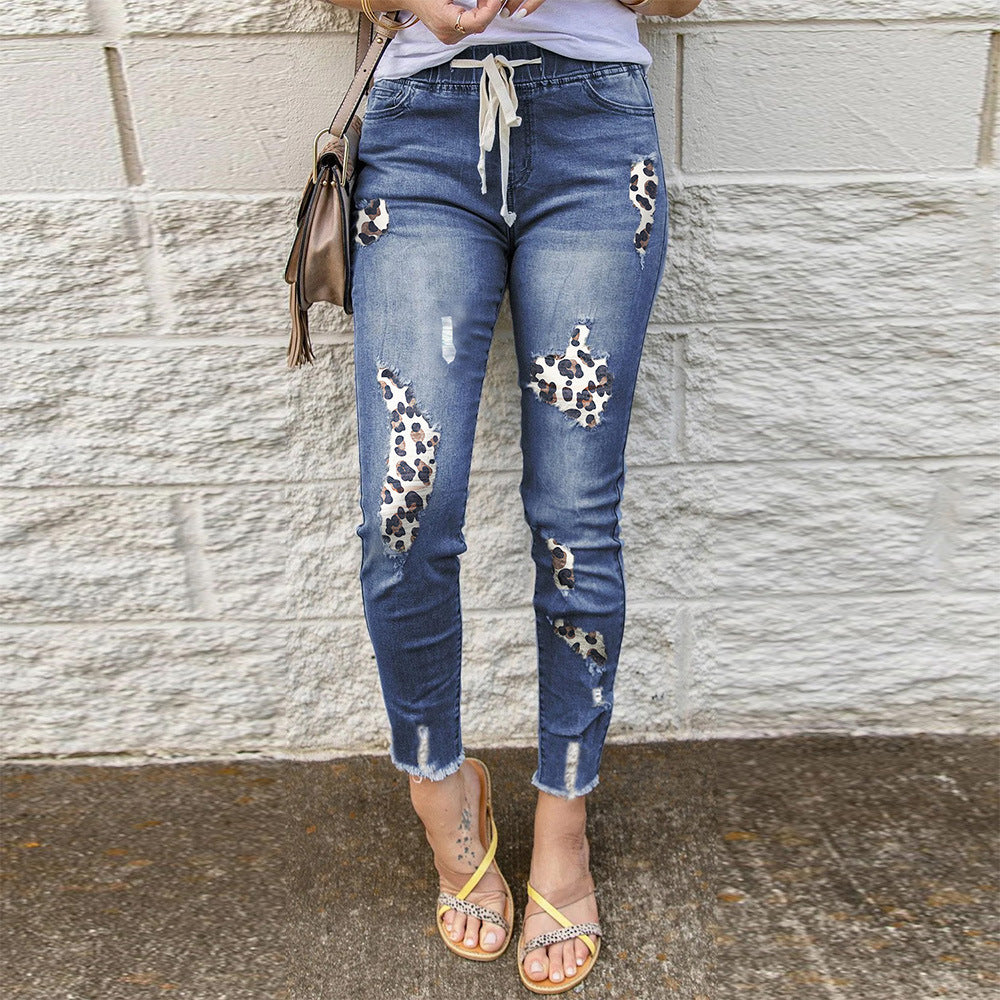 Trendy skinny jeans for women with a unique leopard design and ripped details Lune London