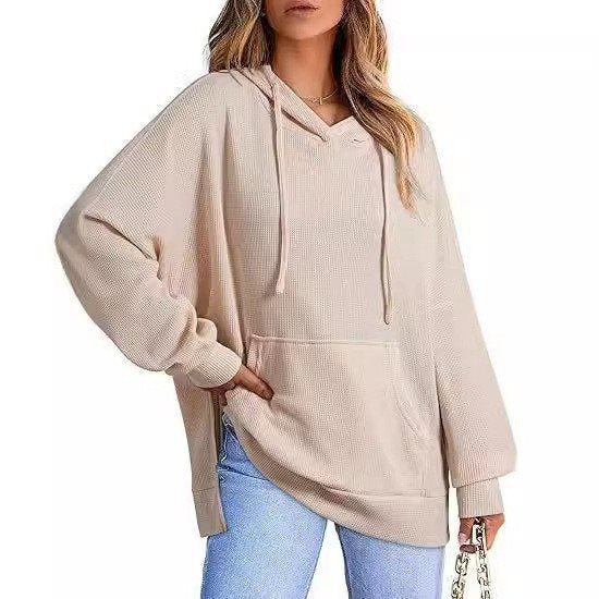 Oversized women's hoodie with side slits and practical pockets Lune London
