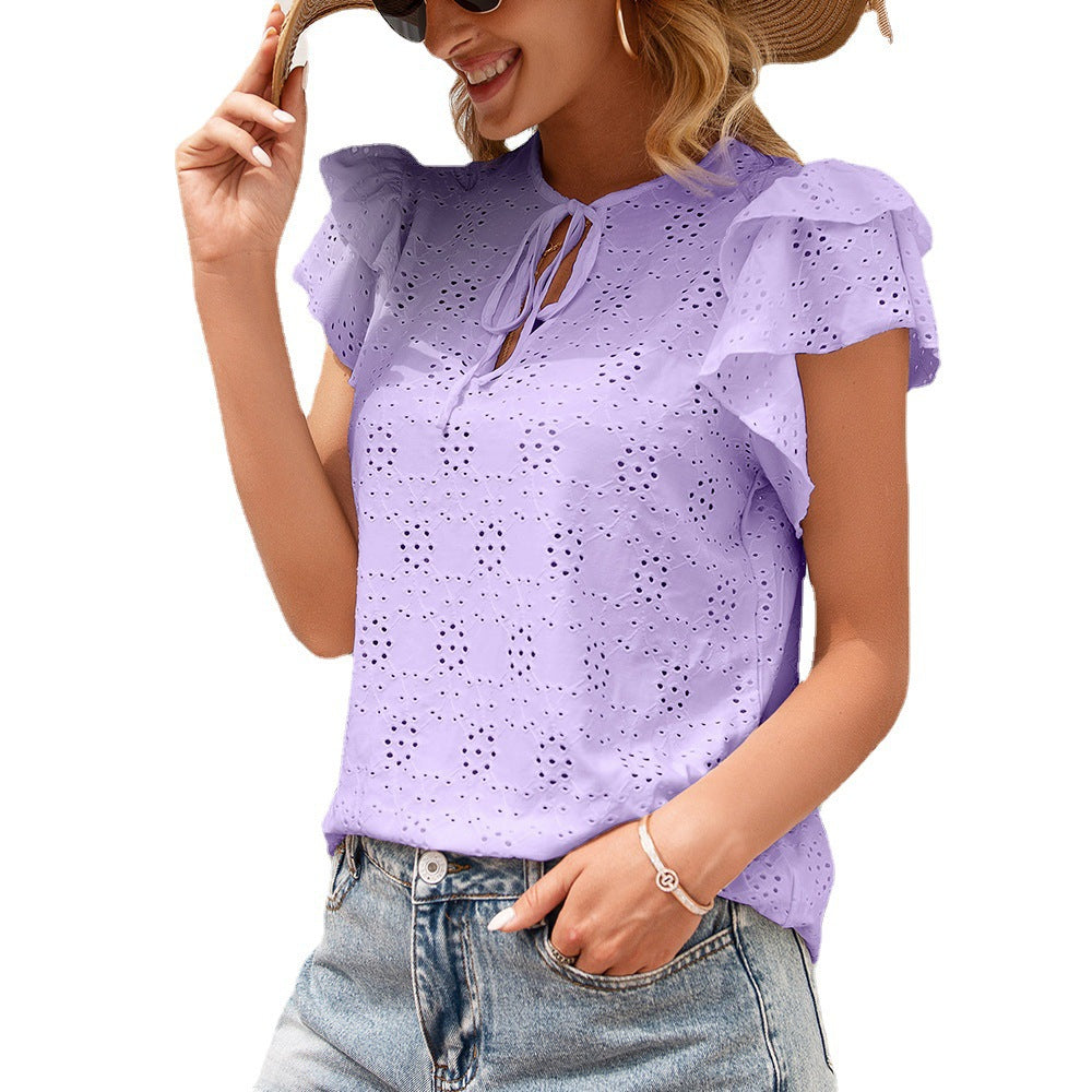Women's blouse with ruffle details and a perforated pattern Lune London