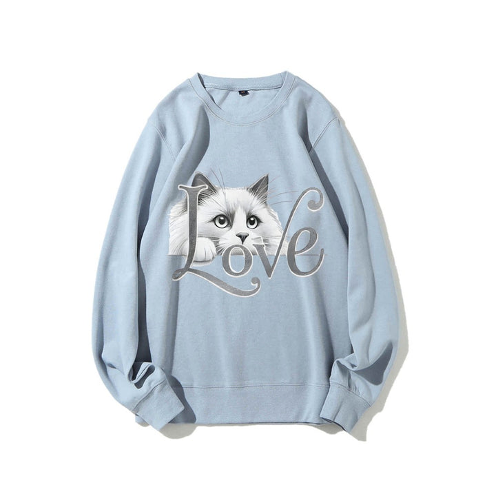 Sweat-shirt pour femmes avec un design de chat ludique et une coupe décontractée Chic & Stil
