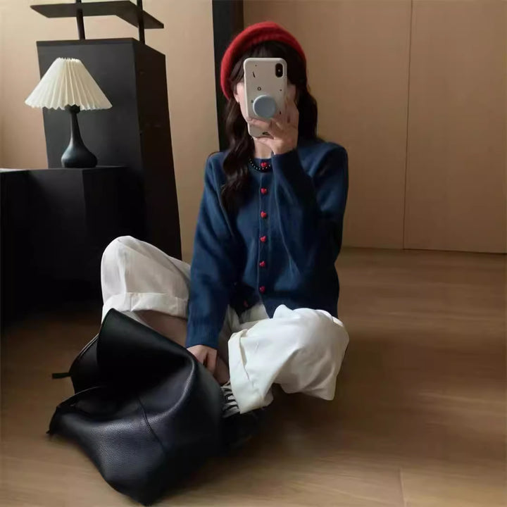Cardigan en tricot doux pour femmes avec des boutons et une texture côtelée Chic & Stil