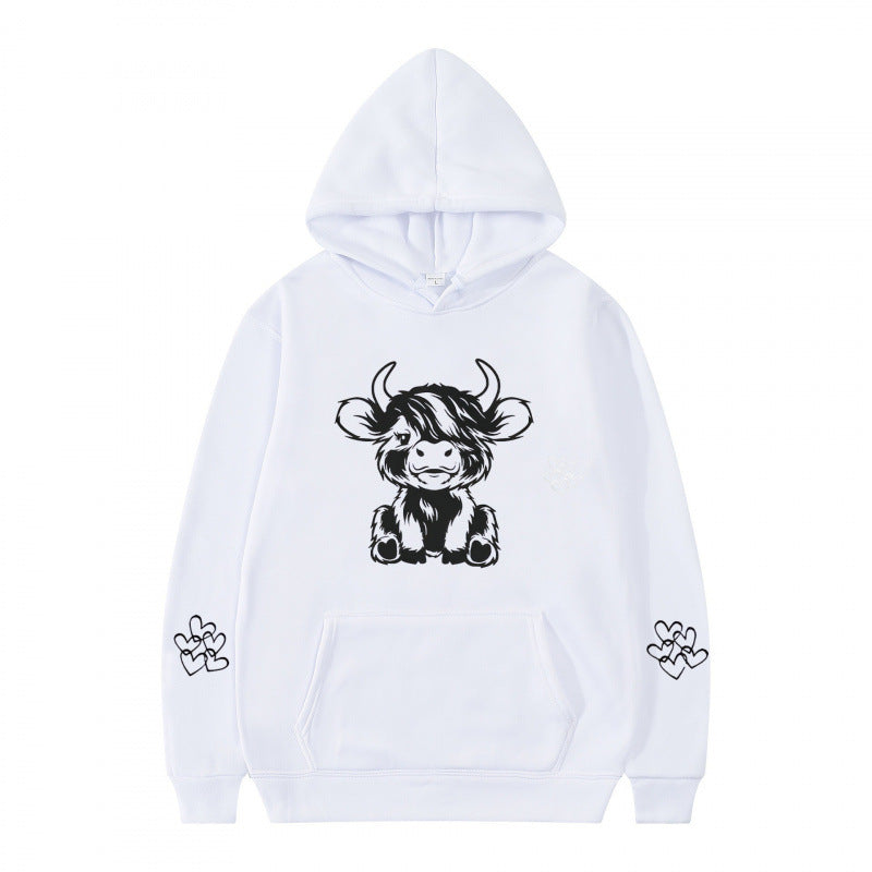 Women's hooded sweatshirt with charming cow motif and practical kangaroo pockets Lune London