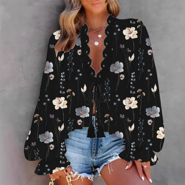 Lune London women's blouse with a playful floral print and lace edges
