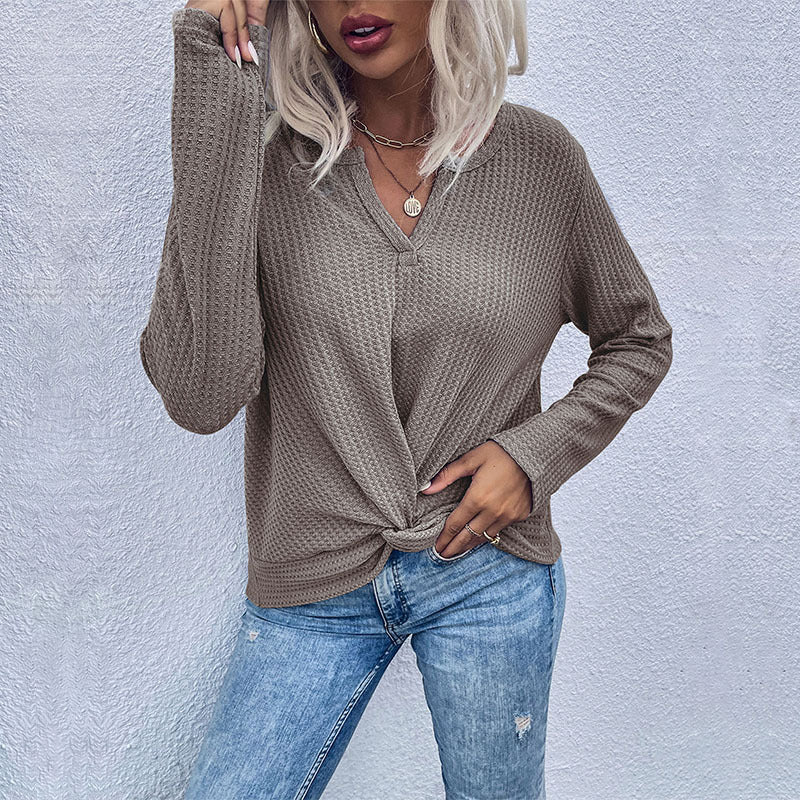 Women's casual long sleeve t-shirt with button details and textured design Lune London
