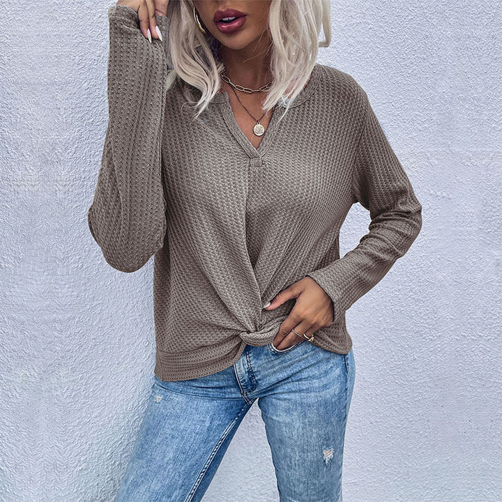 Women's casual long sleeve t-shirt with button details and textured design Lune London