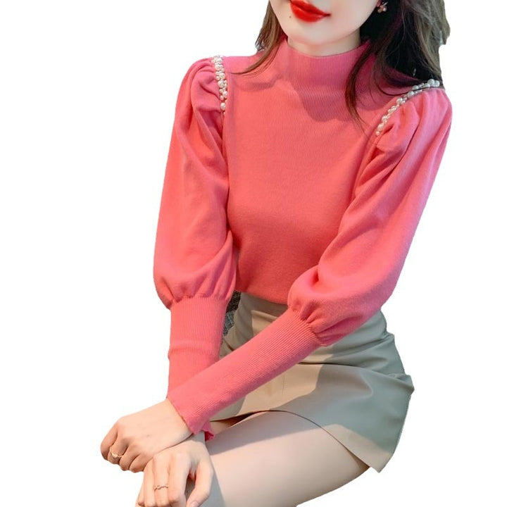 Elegant sweater for women with puff sleeves and pearl details Lune London