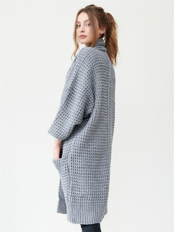 Ladies chunky knit cardigan with open fronts and practical pockets Lune London