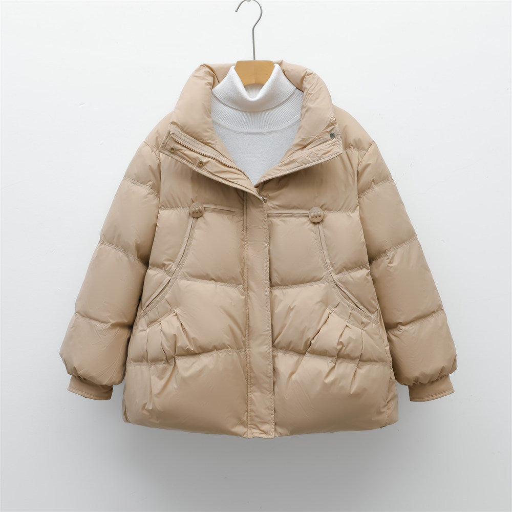 Bulky winter jacket for women with practical pockets and high collar Lune London