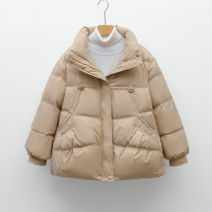 Bulky winter jacket for women with practical pockets and high collar Lune London