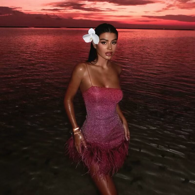 Glamorous ruffled dress for women with spaghetti straps and a feather-shaped hem Lune London