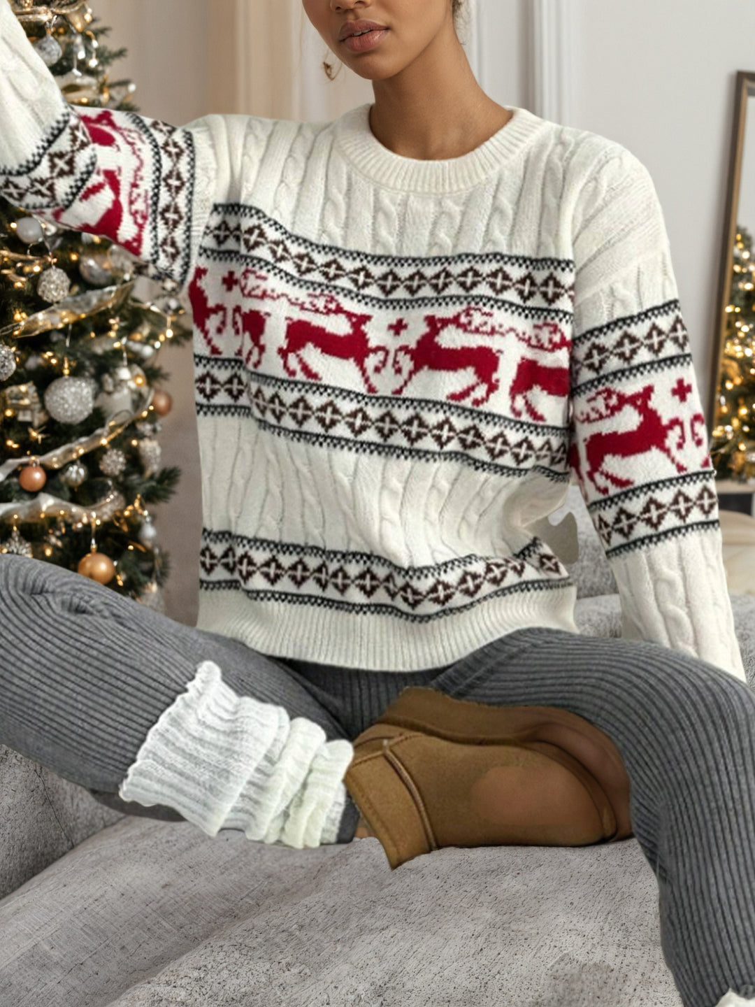 Knitted sweater for women with festive reindeer pattern and luxurious cable pattern Lune London