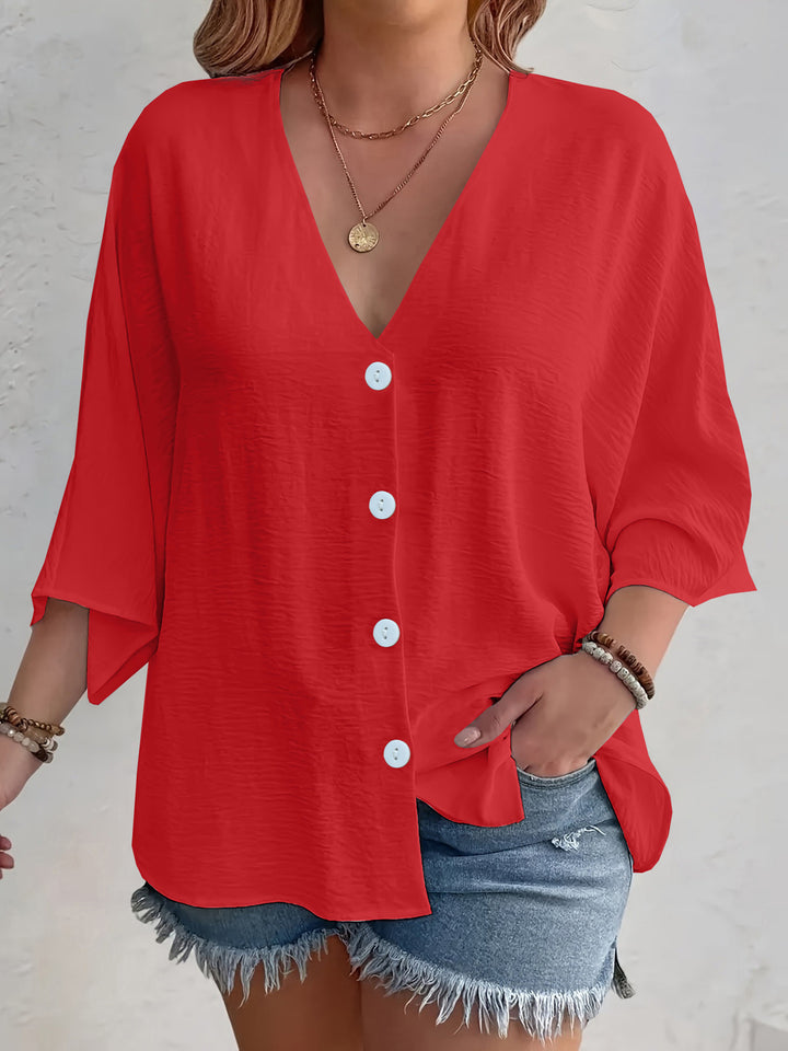 Short-sleeved advantageous blouse for ladies with button placket and V neckline Lune London