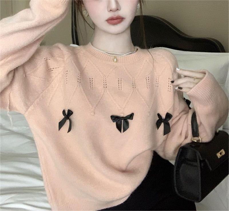 Pull confortable pour femmes avec des appliqués en nœud ludiques Chic & Stil