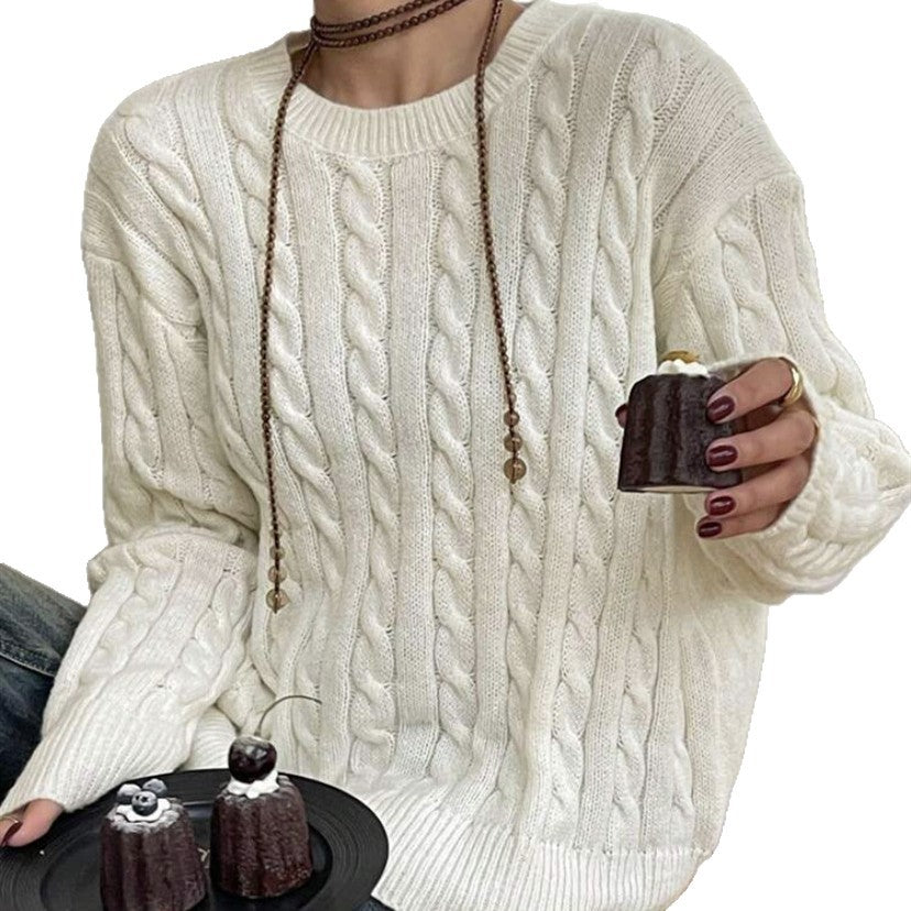 Chunky knit sweater for ladies with cable pattern and wide sleeves Lune London