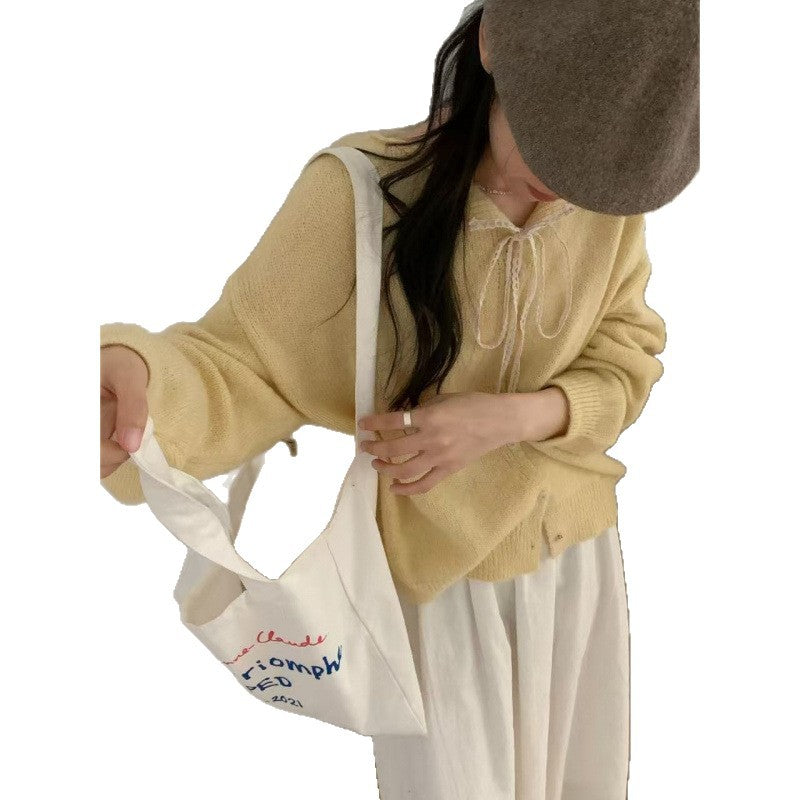 Cardigan à boutons pour femmes avec drap de tirage romantique