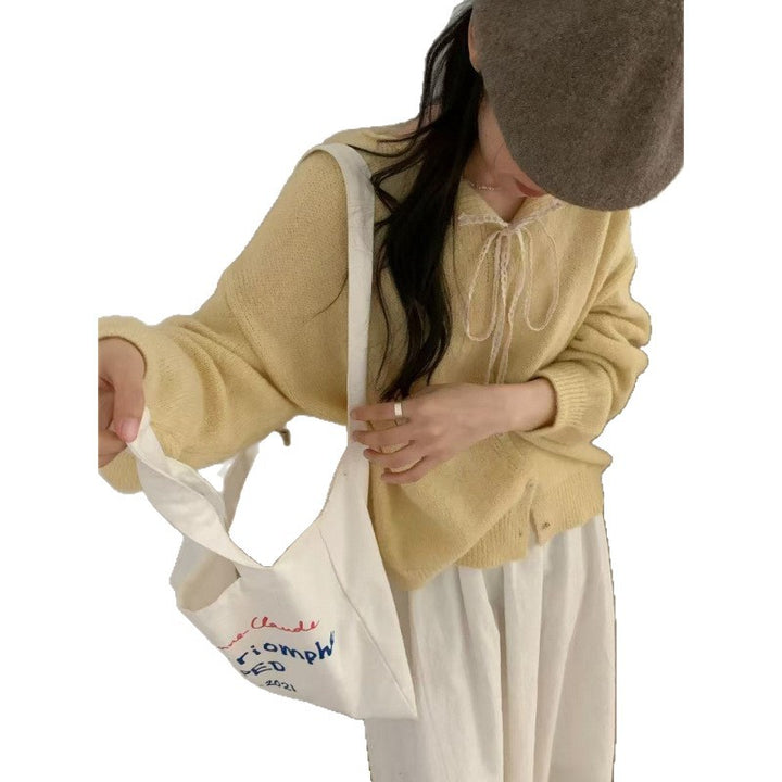 Cardigan à boutons pour femmes avec drap de tirage romantique