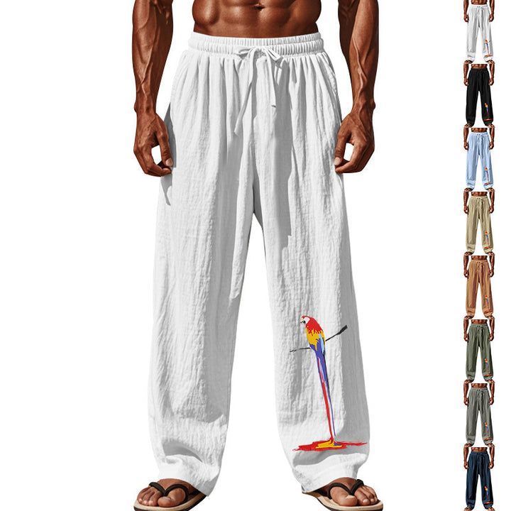Casual beach pants for men with elastic waistband and colorful bird pattern Lune London