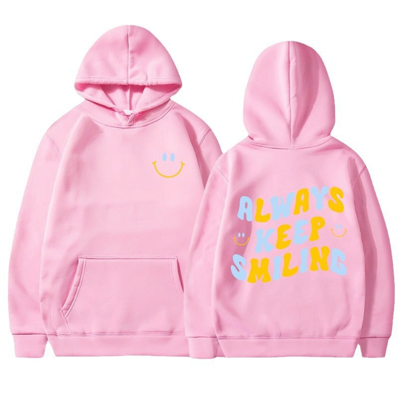 Ladies hoodie with cheerful lettering and practical kangaroo pockets Lune London
