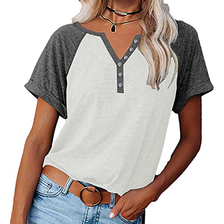 Women's raglan style T-shirt with decorative button details and relaxed fit Lune London