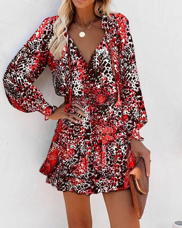 Ladies mini playful dress with colorful pattern and flounced details Lune London