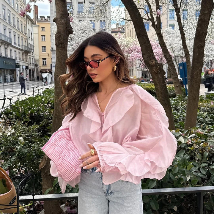 Blouse woman with voluminous ruffle details and a wavy hem Lune London